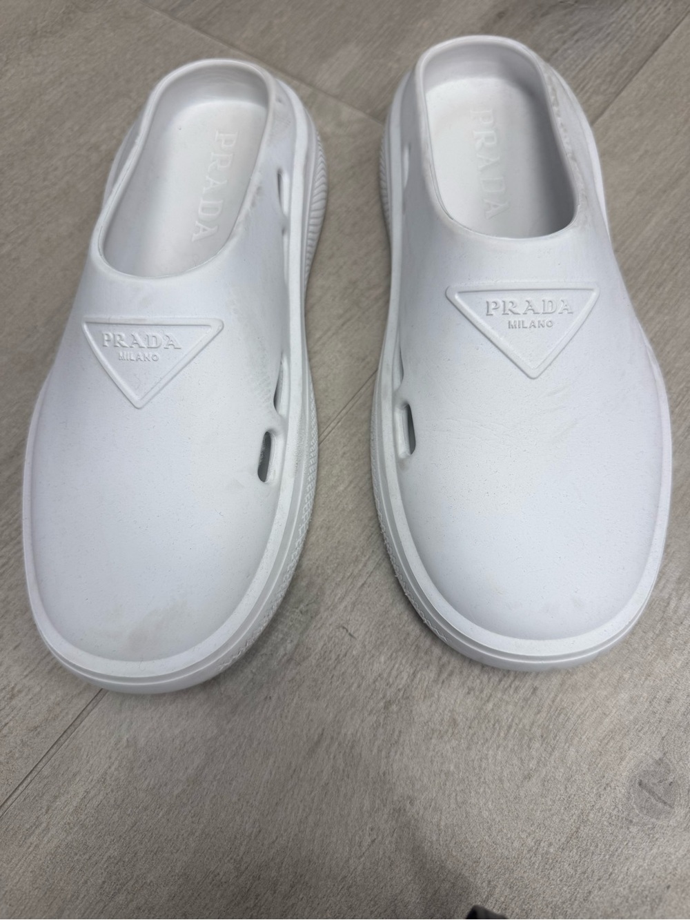 Prada White Slip-On Rubber Clogs with Triangular Logo